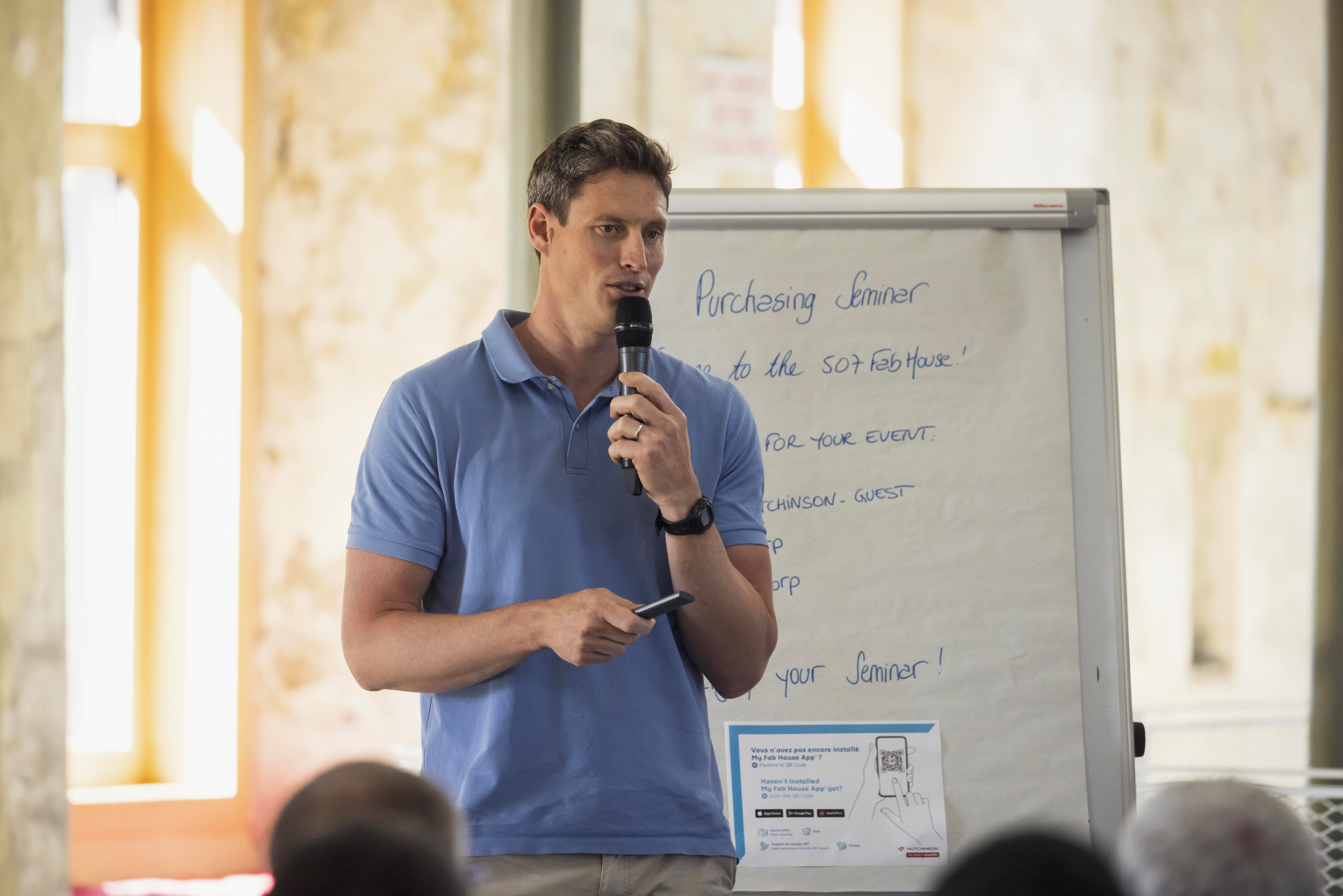 Jonathan Lobert delivering an inspiring keynote on leadership and team performance